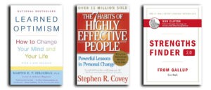 Covers of Learned Optimism by Martin Seligman The 7 Habits of Highly SuccessfulPeople by Stephen R Covey and StrengthsFinder 2.0 by Tom Rath
