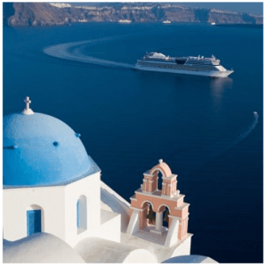 A cruise ship is seen in the background over the edge of a Mediterranean structure