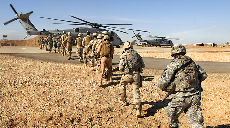 Iraqi Soldiers From The 1st Iraqi Army Division And U.S. Soldiers Board A U.S. Marine Corps CH-53 Super Stallion Helicopter At Camp Ramadi, Iraq, Nov. 15, 2009, During A Static Loading Exercise Being Conducted To Prepare For Upcoming Missions. The Soldiers Are Assigned To The 2nd Battalion, 504th Parachute Infantry Regiment, 1st Brigade Combat Team, 82nd Airborne Division. (DoD Photo By Staff Sgt. Daniel St. Pierre, U.S. Air Force/Released)