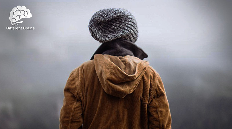 A person stands with their back to the camera