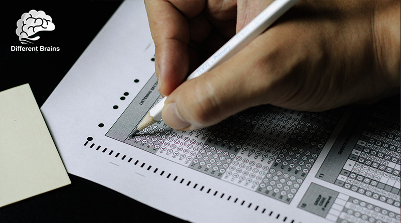 A close up of someone filling out answers on a test.