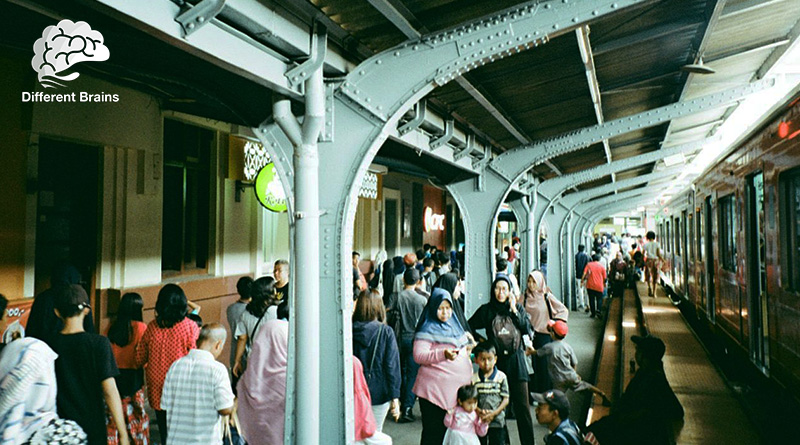 Commuters gathered at a busy train station